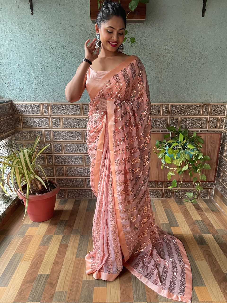 Mauni 01 New Stylish Party Wear Georgette Heavy Saree Collection